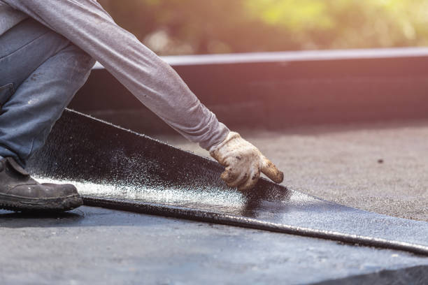 Professional Waterproofing technician working in Troy, IL